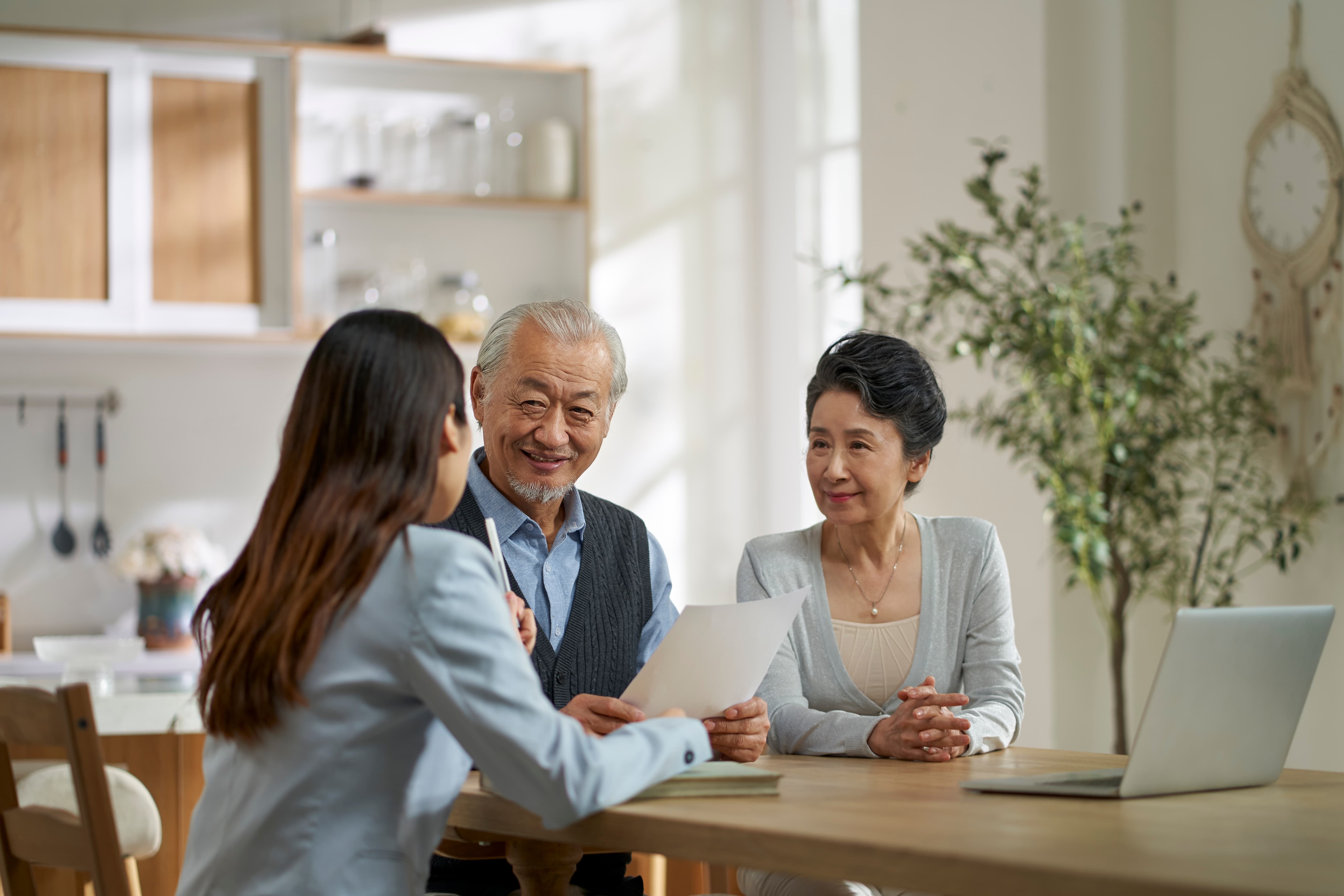 A senior couple taking an important decision — the everyday moments Caring For Them helps families preserve.